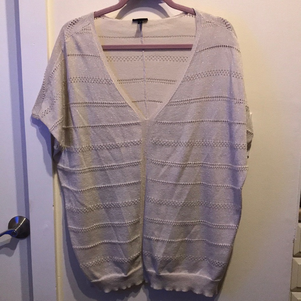 Torrid pullover top in various sizes.